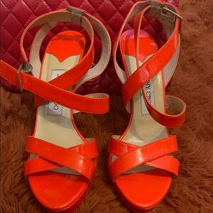 Jimmy Choo Glossy Orange Crisscross Patent Leather Heels